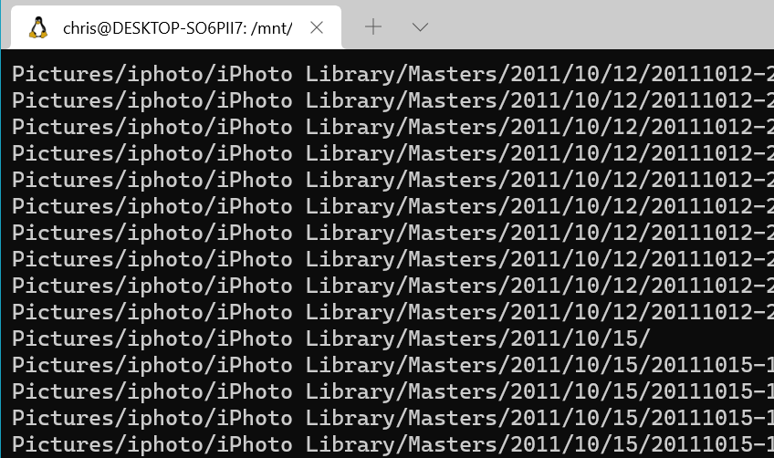 a screenshot of file names scrolling past in a terminal window