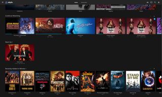 Our Jellyfin dashboard displaying various media in rows such as Recently Added in Movies and Continue Watching