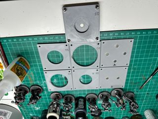 a photo of the MagPuck being assembled with a 25mm plate