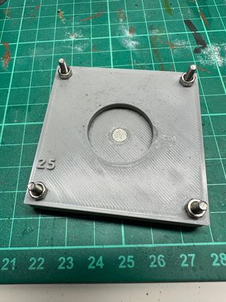 a photo of the MagPuck being 3D printed