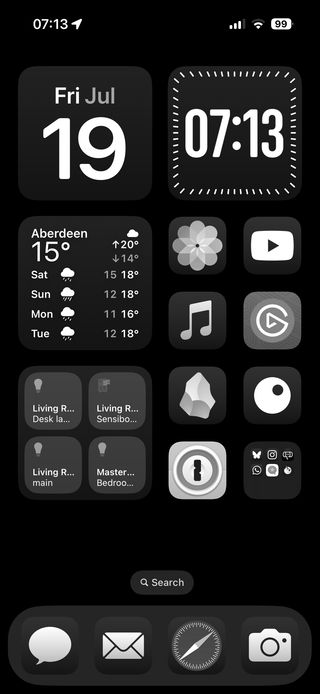 The image shows a iPhone home screen with a plain black background. It features a large digital clock in the center, weather icons, and a padlock icon indicating smart home connectivity. The top of the screen displays signal, Wi-Fi, and battery icons, while the bottom has a prompt to swipe up to open. The icons and widgets have been tinted so they are in greyscale/black and white.