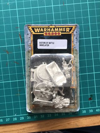 a blister pack of metal parts