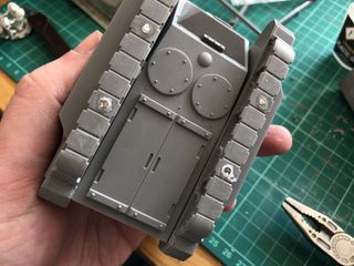 The underside of the model, showing 4 magnets glued into the tank tracks - 2 on each side