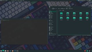 Manjaro linux desktop showing the file explorer and terminal applications