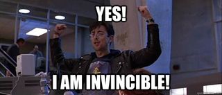 A meme based on a scene from the 1995 James Bond movie GoldenEye. The person in the image is Boris Grishenko, a Russian hacker and one of the villains in the movie. He is played by actor Alan Cumming. He is standing in triumph, fists raised, and shouting 'Yes! I am invincible!'